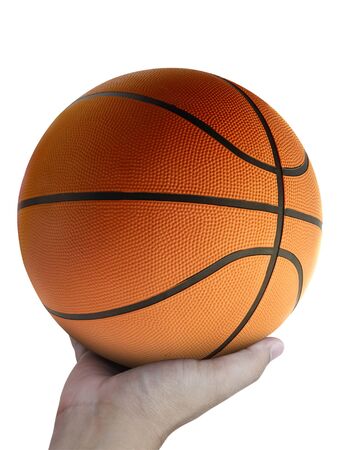 Basketball player holding a ball against white backgroundの写真素材