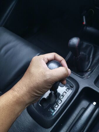 Detail of Hand in gear shiftの写真素材