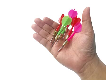hand holding darts arrow isolated on white background. concept marketing targetの写真素材