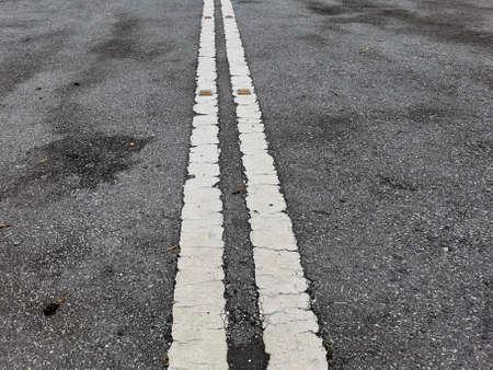 bad road damage of a thailand country roadの写真素材