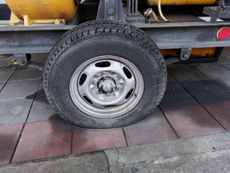 Close up old tire and flat tire