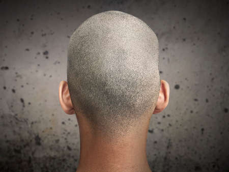 Young man with a shaved headの写真素材