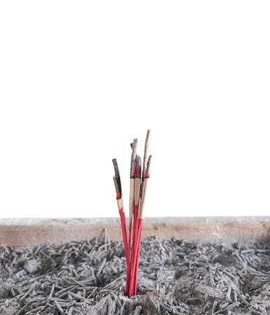 Incense sticks and incense burners isolated on white background (Thailand style)の写真素材
