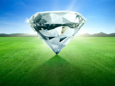 precious crystal clear diamond sparkling in the blue skyの写真素材