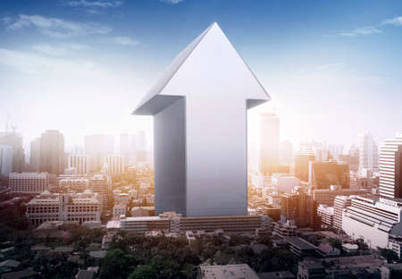 Arrows on skyscrapers background. Ambition and challenge conceptの写真素材
