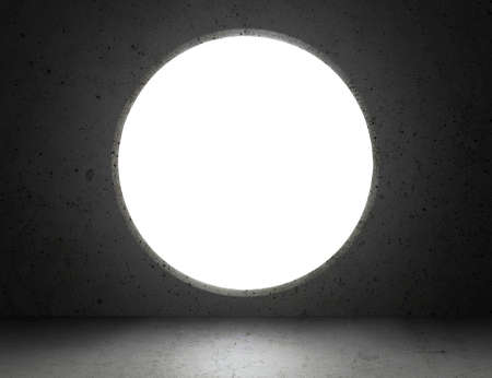 Bright white light shines from background circle door in dark room. Dream, success, opportunity....