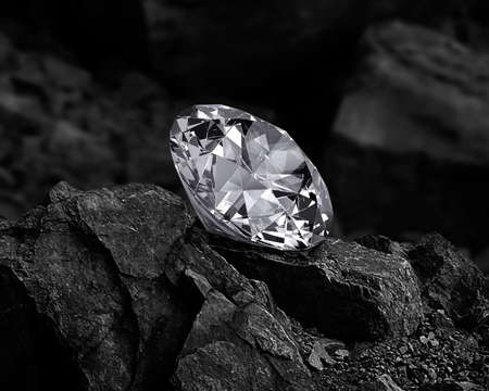 diamond on black coal backgroundの写真素材
