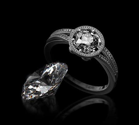diamond luxury ring close up.diamond stones appraiser. jewelry quality check.manufacture of precious stones. inspection of artificial diamond.wedding symbol. a gift to your beloved woman for a holidayの写真素材