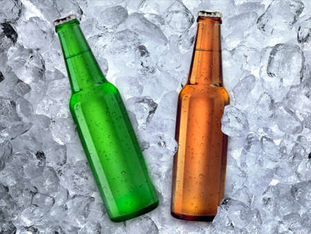 Beer bottle on ice cubes backgroundの写真素材