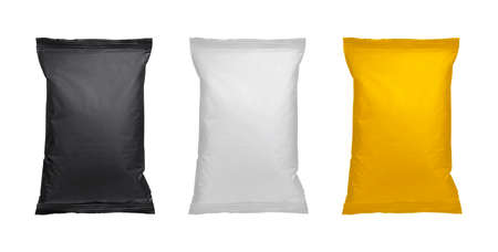 White, black and yellow pillow bag of chips, snacks or candys. Top view. Isolated on white...
