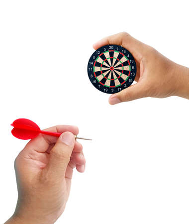 Human hand throwing darts, Male hand target holding a dart board. Idea concept businessの写真素材