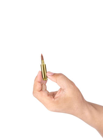 bullet in a man's hand on a white backgroundの写真素材