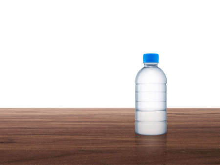 Plastic water bottle on wooden table