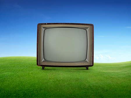 Vintage retro tv on grassの写真素材