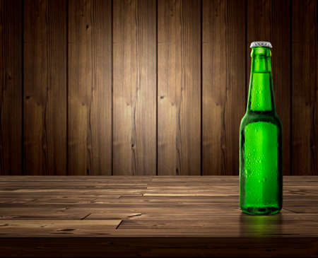 bottle of beer on a wooden backgroundの写真素材