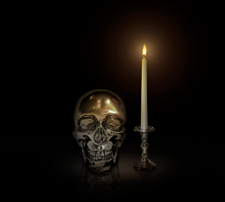 Iron skull and Candle light on a candlestick on a black background, Halloween day conceptの写真素材