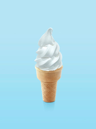 Ice cream cone on blue backgroundの写真素材