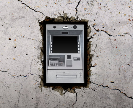 Atm Machine on through the wall with cracksの写真素材