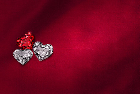 Heart shaped diamond on red fabric background. 3d renderの写真素材