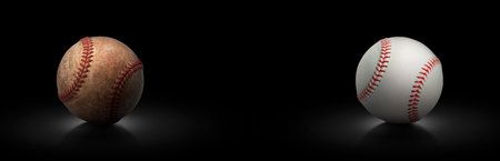 baseball ball on black background, wide imageの写真素材