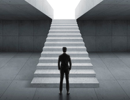 Businessman looking at stairs. business start conceptの写真素材