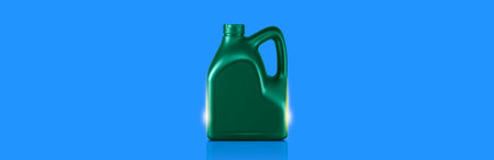 canisters of lubricating oil or motor oil on blue backgroundの写真素材