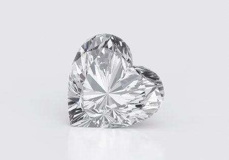 Heart diamond with reflection on white backgroundの写真素材