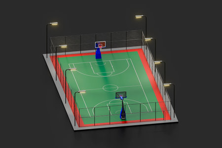 Basketball court illuminated at nightの写真素材