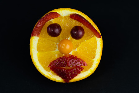 funny orange faceの写真素材