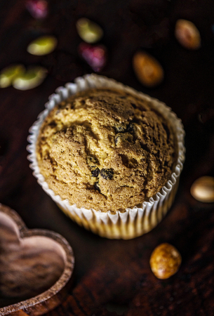 Gluten free sweet muffins on a dark Septemberの写真素材