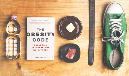 Dr Jason Fung book and some essential elements of intermittent fasting way of eating.の写真素材