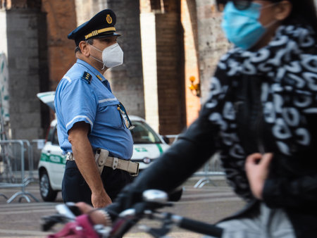 tighter controls at the street food market police officer check residents fever or temperature...