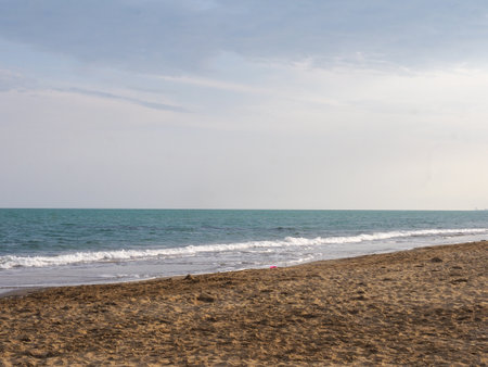 deserted scenery in the late afternoon in Brussa beach in Veneto, Italyのeditorial素材
