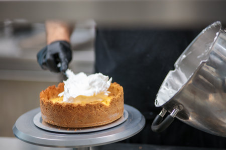 catering chef preparing key lime pie in pro kitchenの写真素材