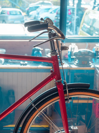 at the bike shop store and repair, artisan expert mechanic expert repairs restore and wreck bicycleの写真素材