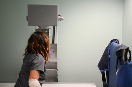 A veterinary professional uses advanced equipment to perform diagnostic imaging on an animal patient...