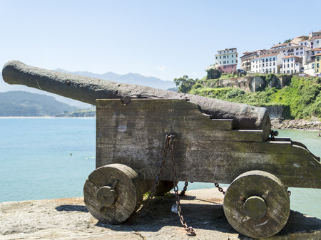 Old cannon in front of Lastres, Spainの写真素材