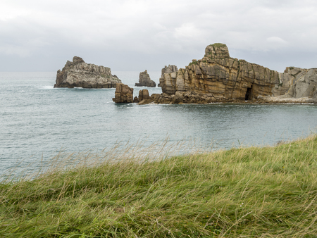 Cliffs and reefs on the Cantabrian coast in Spainの写真素材