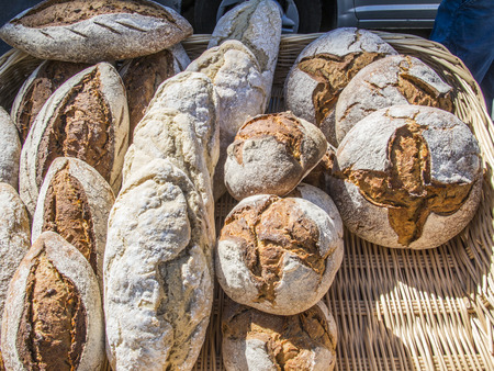 Bread exposed in a wicker basketの写真素材