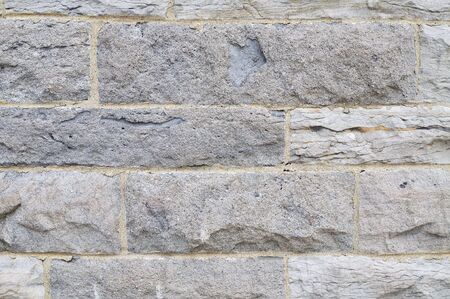 Close-up picture of stone blocks wall (background, texture)の写真素材