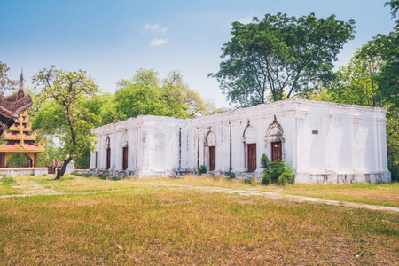 A colonial western looking architecture in the grounds of the Mandalay Palace in Myanmarの写真素材