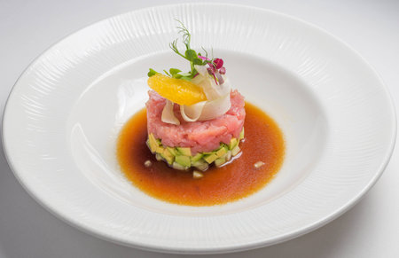 Salmon tartar, gourmet Food served on white plateの写真素材