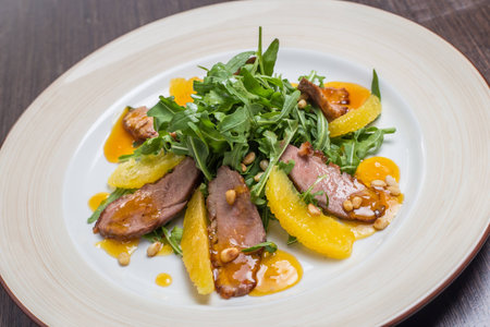 Duck Breast with Orange and saladの写真素材