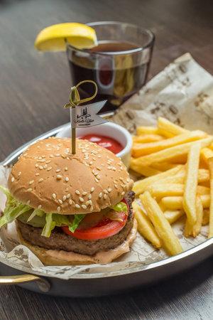 fast food menu with hamburger, french fries and glass of colaの写真素材