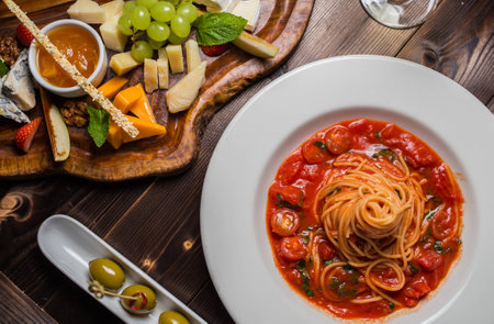 Fettuccine in tomato sauce with shrimp and tomatoesの写真素材