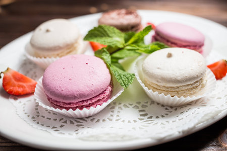 Several macaroons on a white plate. restaurantの写真素材