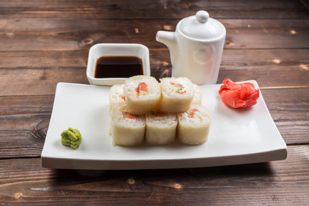 Maki rolls with smoked salmon with wasabi on back frontの写真素材
