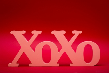 a wood carved X and Oの写真素材