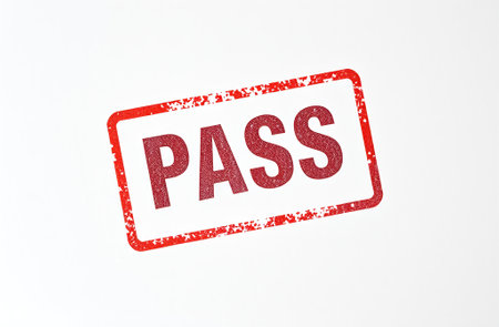 Pass red rubber stamp isolated on white background with soft shadow. Stamps have been removed.の素材