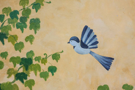 Wall decoration with a bird pictureの写真素材